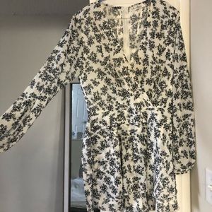 Thin light romper with a tie in front